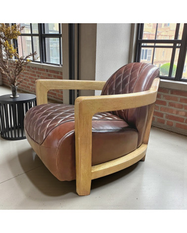 Fauteuil design Hugues en cuir vintage marron – mise en situation