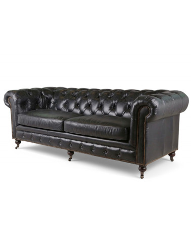 Canapé Chesterfield cuir noir vintage vue de côté – Collection The First