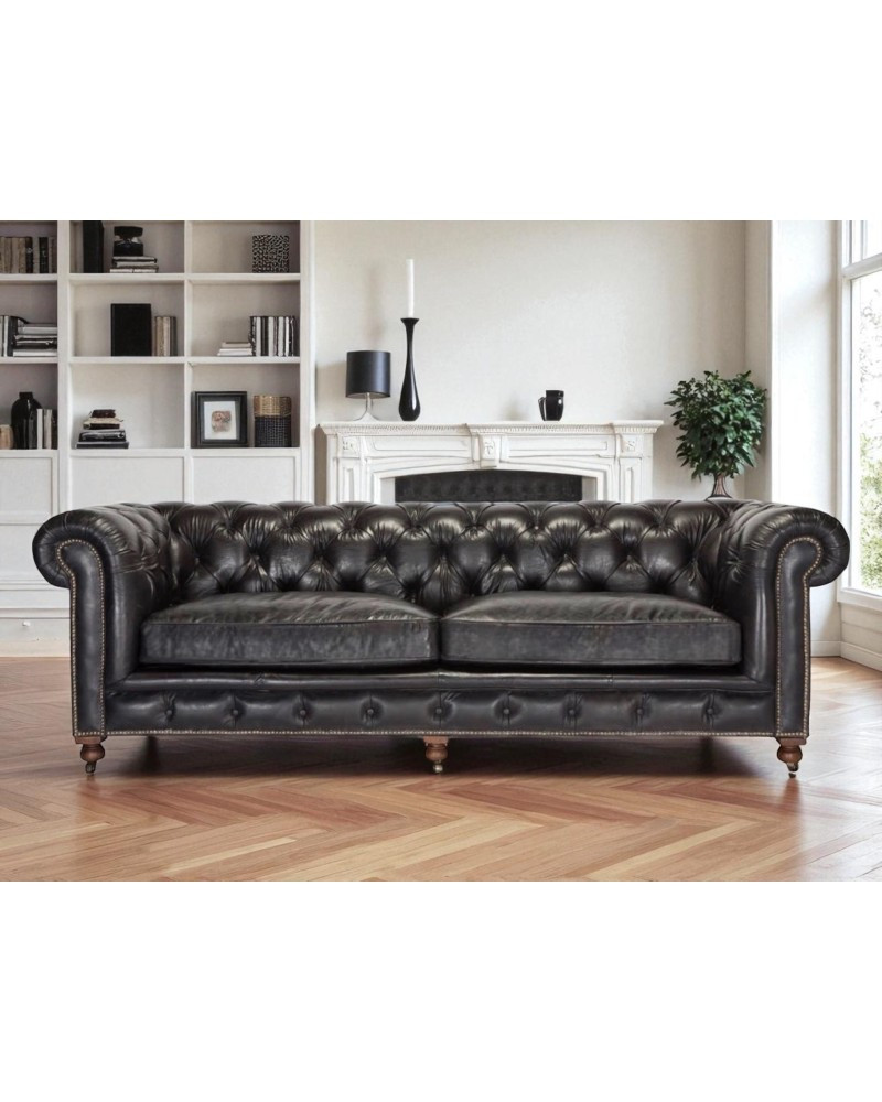Canapé Chesterfield cuir noir vintage en situation – Collection The First